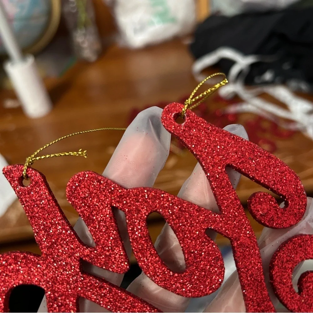 Red Glittery Cursive “Joy” Christmas Ornament - “Dressing”